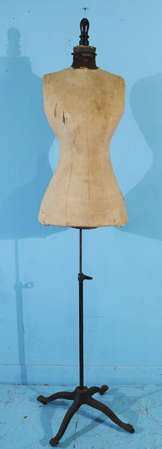 410a - Old store dress maker with cast iron base