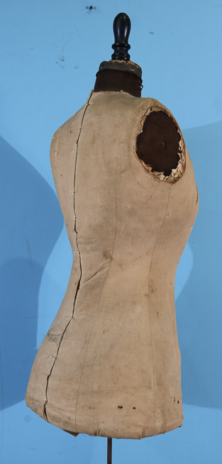 410d - Old store dress maker with cast iron base