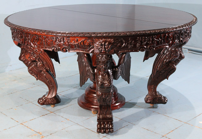 080a - Magnificent heavily carved 60 in. dining table