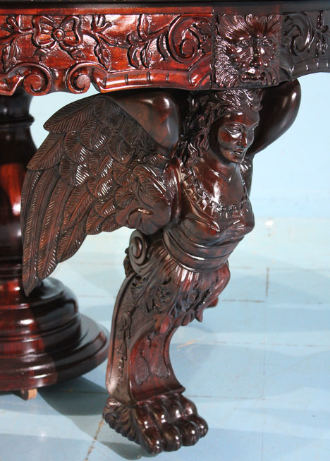 080c - Magnificent heavily carved 60 in. dining table