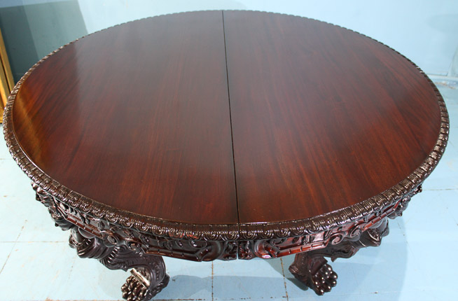 080d - Magnificent heavily carved 60 in. dining table