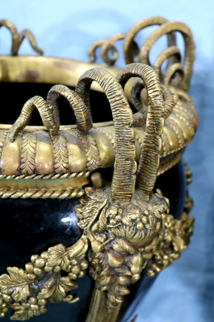 001e - Pair of heavy bronze mounted urns with porcelain bowls and mythological faces, 25.5 in. T, 12.5 in. Dia.