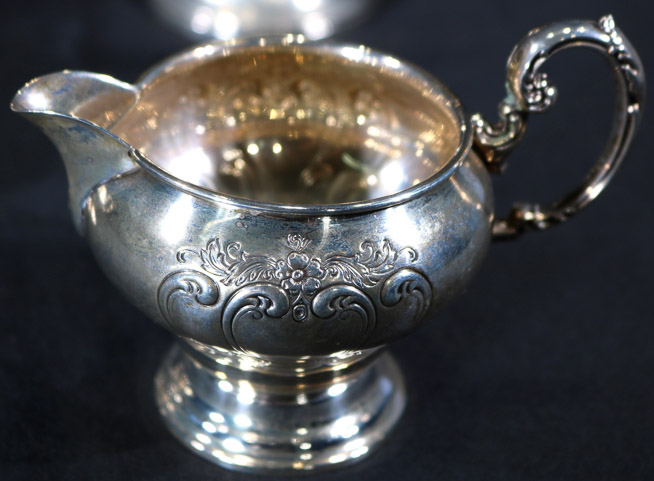 025b - 4 pieces of sterling, 2  compotes, sugar and creamer, 7 in. T, 6.5 in. dia.