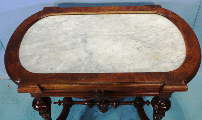 030c - Walnut Victorian parlor table with inserted marble top, 29 in. T, 38 in. W, 24 in. D.