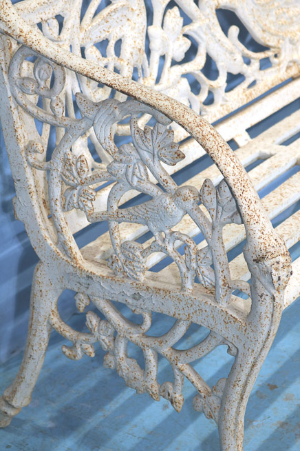 037c - Large cast iron garden bench with bird pattern, very heavy, 43 in. T, 72.5 in. W, 16 in. D.