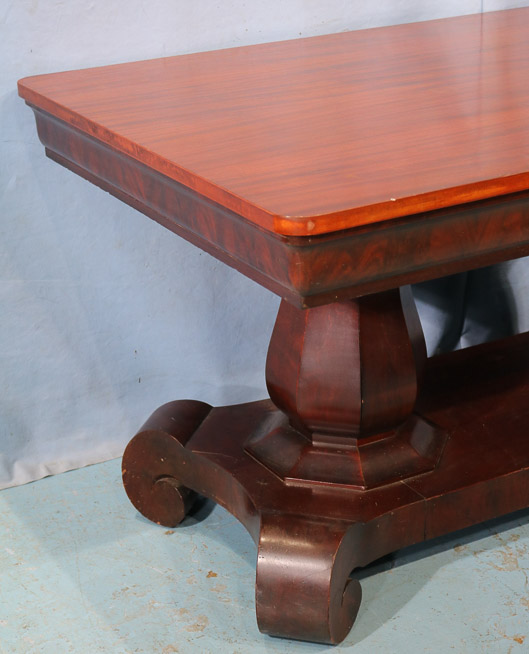 048d - Large solid mahogany library table with scroll feet and drawer, 29.5 in. T, 64 in. L, 36 in. D.