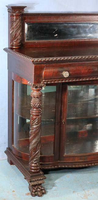 065c - Flame mahogany dessert cabinet with mirrored backsplash, acanthus carved column front and claw feet, 47.5 in. T, 48 in. W, 20 in. D.