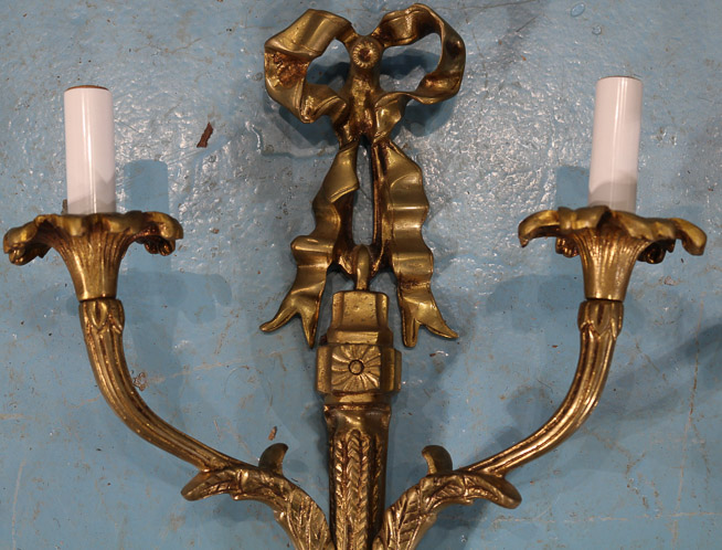 252c - Pair of bronze double arm wall sconces