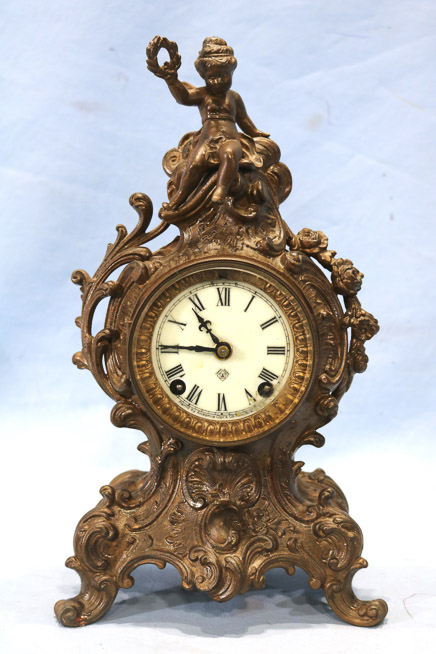 164a - Metal figural ansonia clock, runs, 12 in. T.-9