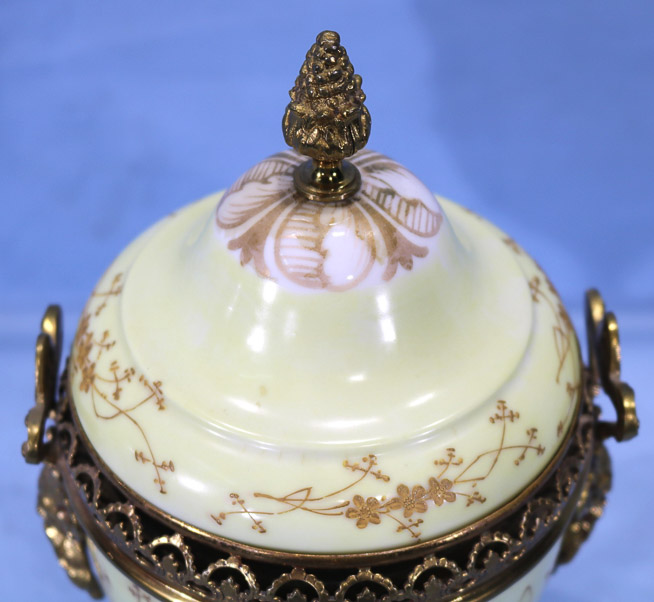 007c - Meissen porcelain figural urn with cross swords mark, dore bronze with west wind head handles, 12.5 in. T.-28
