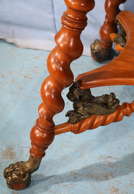 025b - Mahogany center table with bronze claw feet and bronze lions attrib. to Merklen Bros 28.5 in. T, 38 in. W, 24 in. D.-24