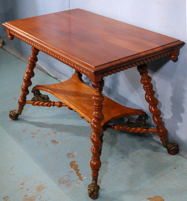 025c - Mahogany center table with bronze claw feet and bronze lions attrib. to Merklen Bros 28.5 in. T, 38 in. W, 24 in. D.-24