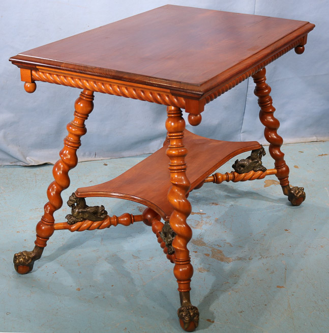 025e -Mahogany center table with bronze claw feet and bronze lions attrib. to Merklen Bros 28.5 in. T, 38 in. W, 24 in. D.-24
