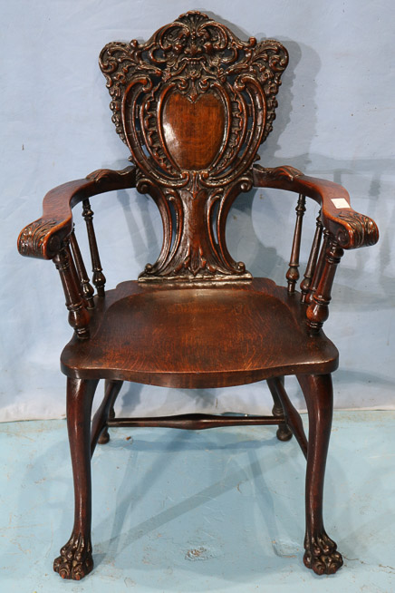 028a - Heavily carved oak Stickley and Brandt arm chair. 38.5 in. T, 24 in. W, 19 in. D.-28