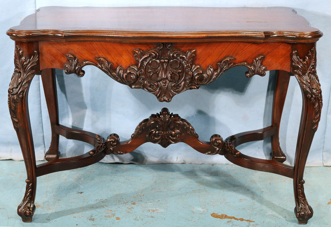 030a - Mahogany heavily carved center table, 29.5 in. T, 45 in. W, 26.5 in. D.-28