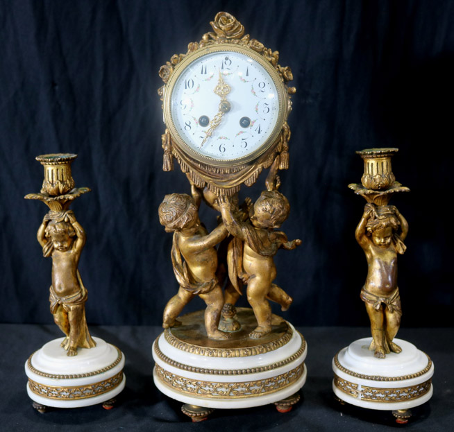 036a - Bronze figural 3 pc. Clock set with cupids and marble base, 16 in. T.-28