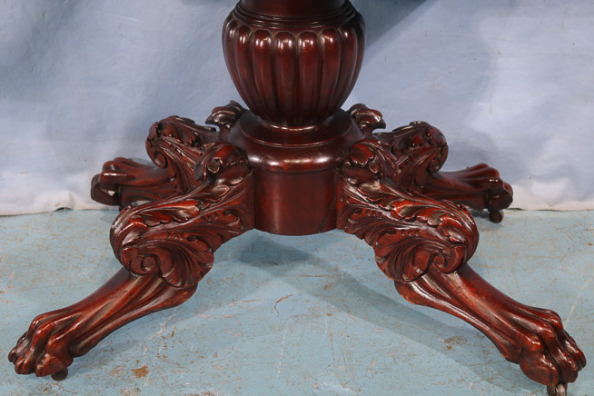 038b - Federal mahogany game table with acanthus carved base and large claw feet, 28 in. T, 36 in. W, 18 in. D.-28