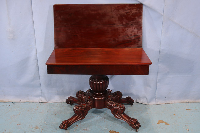 038c - Federal mahogany game table with acanthus carved base and large claw feet, 28 in. T, 36 in. W, 18 in. D.-28