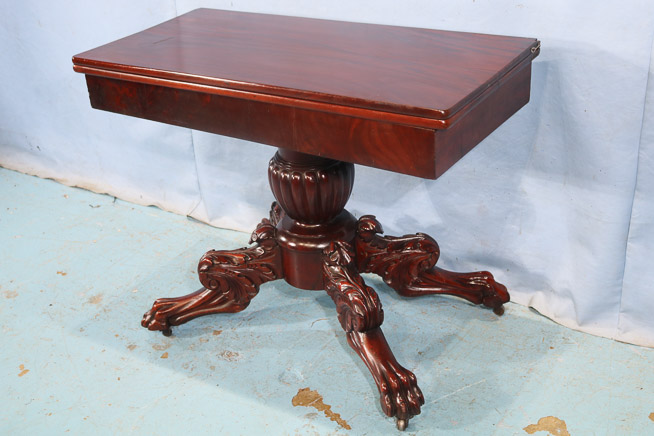 038d - Federal mahogany game table with acanthus carved base and large claw feet, 28 in. T, 36 in. W, 18 in. D.-28