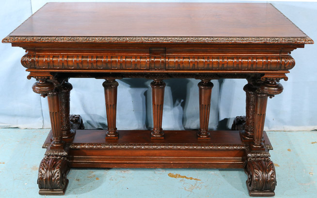 045a - Mahogany heavily carved library table in New York style, 32 in. T, 51 in. W, 33 in. D.-28