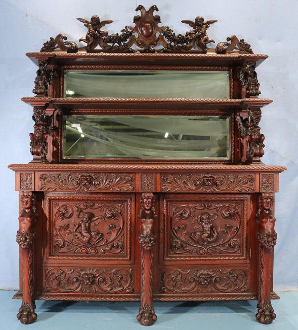 066b - 11 piece Mahogany R.J. Horner dining room suit with cupids, ca. 1890, Sideboard, 90 in. T, 70 in. W, 26.5 in. D.-28