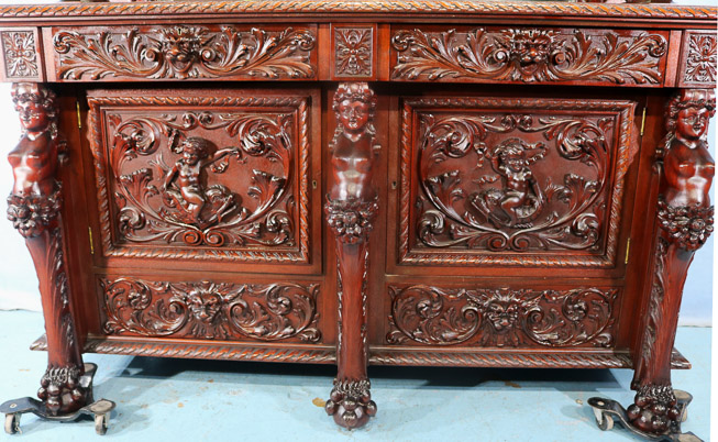 066c - 11 piece Mahogany R.J. Horner dining room suit with cupids, ca. 1890, Sideboard, 90 in. T, 70 in. W, 26.5 in. D.-28