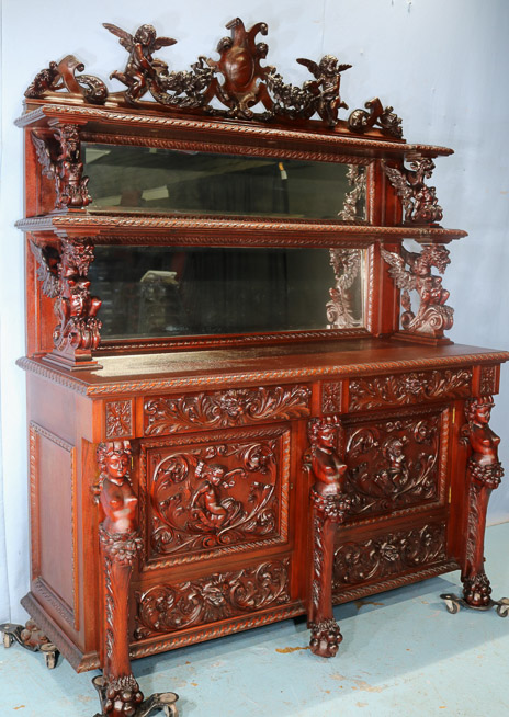 066f - 11 piece Mahogany R.J. Horner dining room suit with cupids, ca. 1890, Sideboard, 90 in. T, 70 in. W, 26.5 in. D.-28