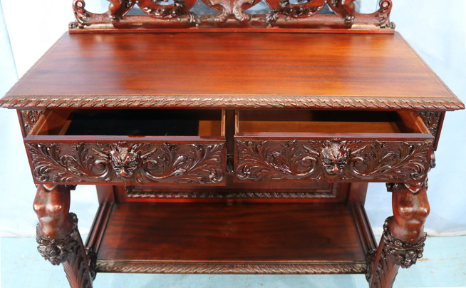 066q - 11 piece Mahogany R.J. Horner dining room suit with cupids, ca. 1890, Server, 55 in. T, 46 in. W, 22 in. D.-28