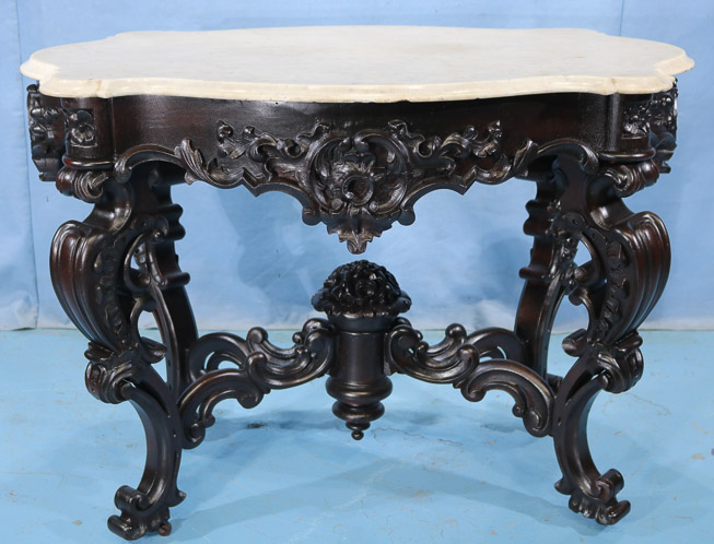 076a - Meeks rosewood heavily carved rococo center table, 30.5 in. T, 33 in. W, 29 in. D.-28