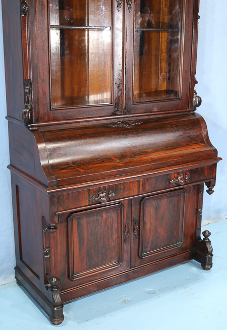 077c - Rosewood rococo slant front secretary, all original with carved crown and carved wood pulls, 45 in. W, 22 in. D, 8 ft. 11 in. T.-28