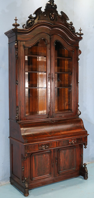 077d - Rosewood rococo slant front secretary, all original with carved crown and carved wood pulls, 45 in. W, 22 in. D, 8 ft. 11 in. T.-28