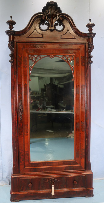 082a - Walnut Victorian 1 door wardrobe with beautiful carved crest and finials, made in N.Y., 8 ft. 7.5 in. T, 44 in. W, 19 in. D.-28