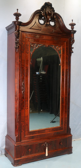 082c - Walnut Victorian 1 door wardrobe with beautiful carved crest and finials, made in N.Y., 8 ft. 7.5 in. T, 44 in. W, 19 in. D.-28