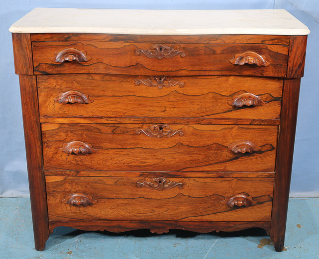 104a - Rosewood Victorian 4 drawer chest with wood carved pulls, 38 in. T, 42 in. W, 17.5 in. D.-28