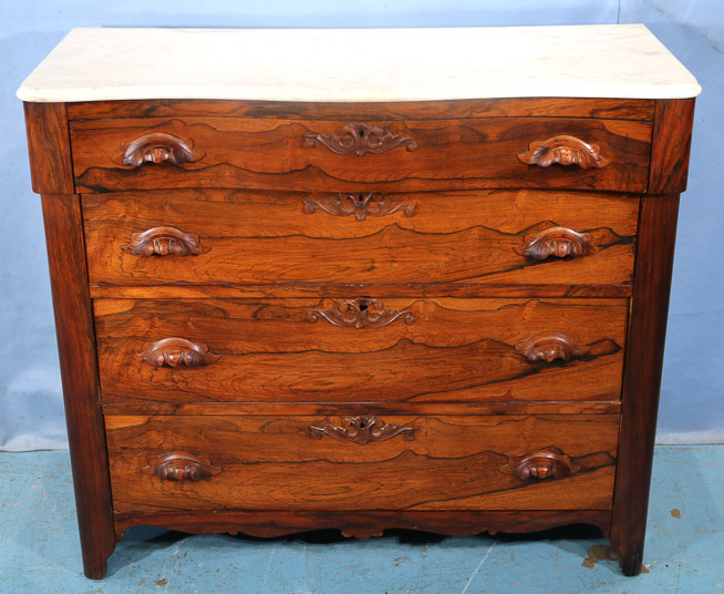 104b - Rosewood Victorian 4 drawer chest with wood carved pulls, 38 in. T, 42 in. W, 17.5 in. D.-28