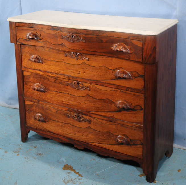 104c - Rosewood Victorian 4 drawer chest with wood carved pulls, 38 in. T, 42 in. W, 17.5 in. D.-28