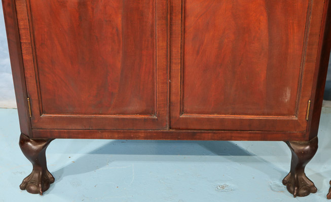 106b - Pair mahogany Chippendale style corner cabinets with ball and claw feet and doors with individual glass panes, 84 in. T, 37 in. W, 21 in. D, ca. 1900-28