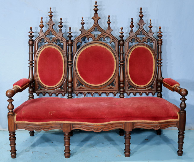 114a - Triple seated gothic walnut hall seat with turned legs and pierced carved back, 55 in. T, 63 in. W, 22 in. D.-28