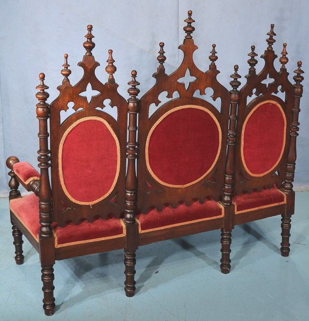 114c - Triple seated gothic walnut hall seat with turned legs and pierced carved back, 55 in. T, 63 in. W, 22 in. D.-28