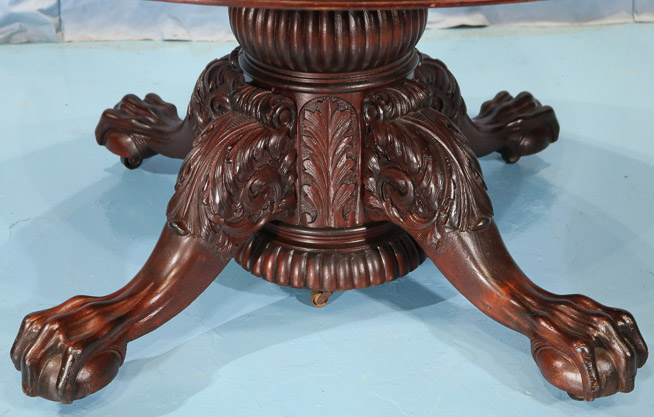 115b - Mahogany Empire banquet table with acanthus carved base and ball and claw feet, 31 in. T, 9 ft. 8 in. W, 54 in. Dia.-28