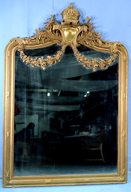 121a - Gold gilded highly decorated wood over the mantle mirror with King's crown in the crest, 73 in. T, 52 in. W.-23