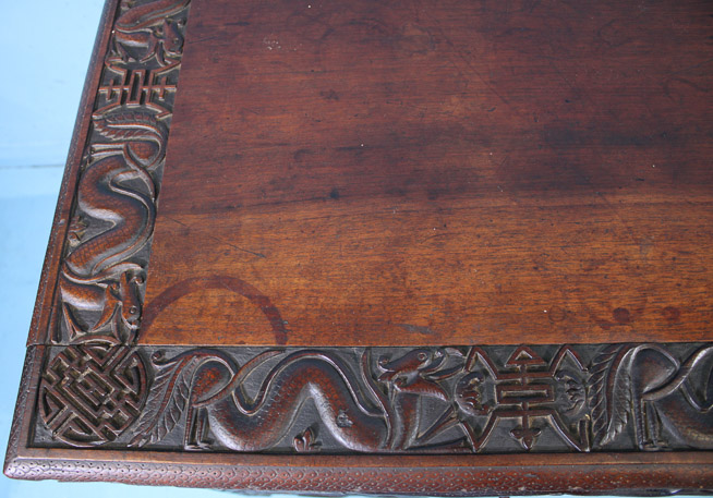 044f - Heavily carved walnut Oriental desk with dragons