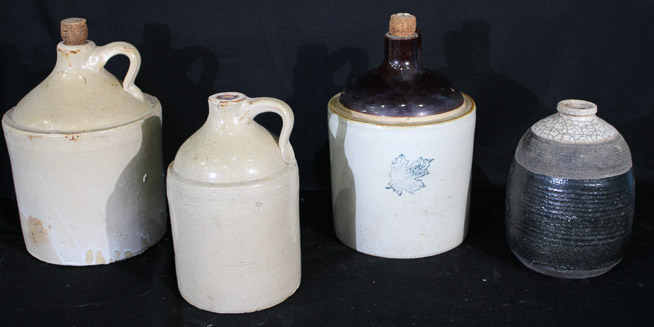 374a - 4 crock jugs, one has maple leaf