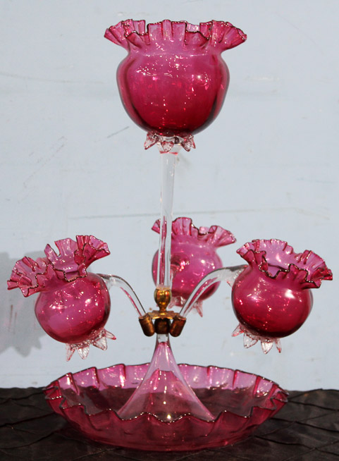 002a - Victorian cranberry 4 trumpet epergne with fluted base and brass accents, 17 in. T, 13 in. W, 15 in. D.