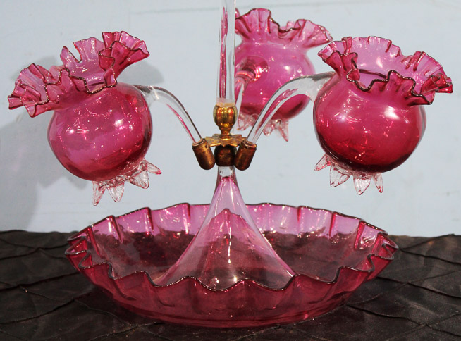 002b - Victorian cranberry 4 trumpet epergne with fluted base and brass accents, 17 in. T, 13 in. W, 15 in. D.