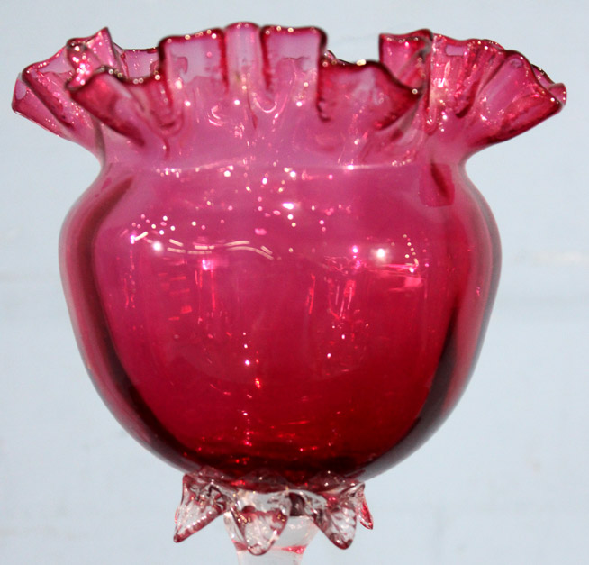 002c - Victorian cranberry 4 trumpet epergne with fluted base and brass accents, 17 in. T, 13 in. W, 15 in. D.