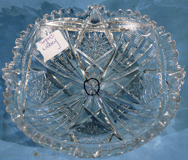 014a - Small shallow brilliant cut glass bowl with scalloped edges and sunburst design, signed Libbey, 2 in. T, 9 in. Dia.