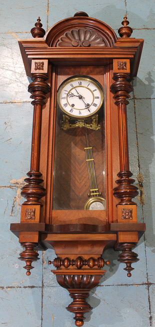 031a - Walnut Junghans wall clock, all original with key and pendulum, 39 in. T, 16 in. W, 9 in. D.