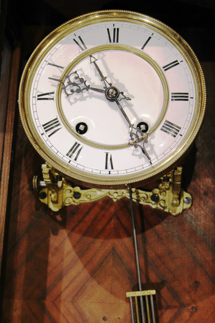 031b - Walnut Junghans wall clock, all original with key and pendulum, 39 in. T, 16 in. W, 9 in. D.