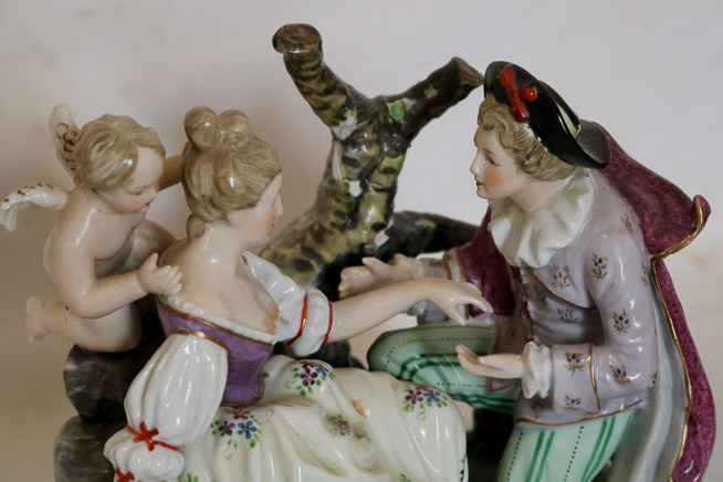 004b - Hand painted porcelain figurine of French scene with cherubs, wedding proposal, 8 in. T, 9 in. W.